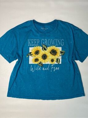 Rebellious One Bright Blue Crop Tee with Yellow Sunflower Graphic